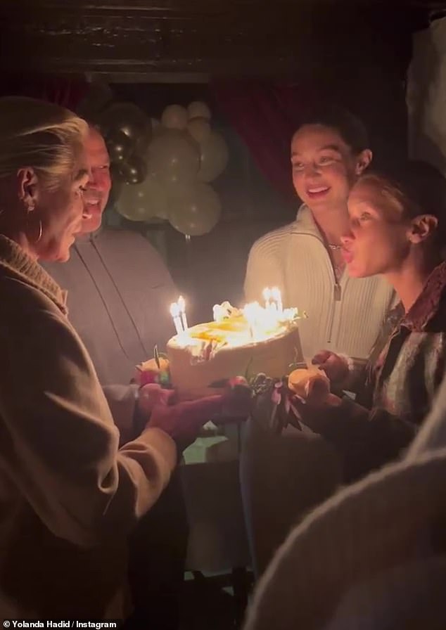 Traditional tune: In a video shared to Instagram Stories, the trio were captured singing the happy birthday song to the Dutch beauty as she celebrated in a dimly lit restaurant