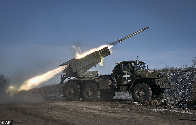 The Ukrainian army's Grad multiple rocket launcher fires rockets at Russian frontline positions near Soledar, Donetsk region, Ukraine, on Wednesday.