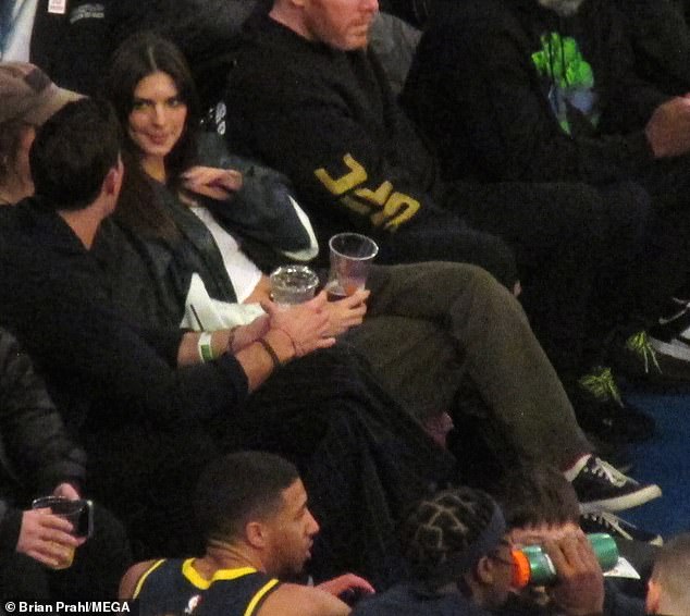 Conversation: The couple were seen talking animatedly in courtside VIP seats while watching the basketball game.