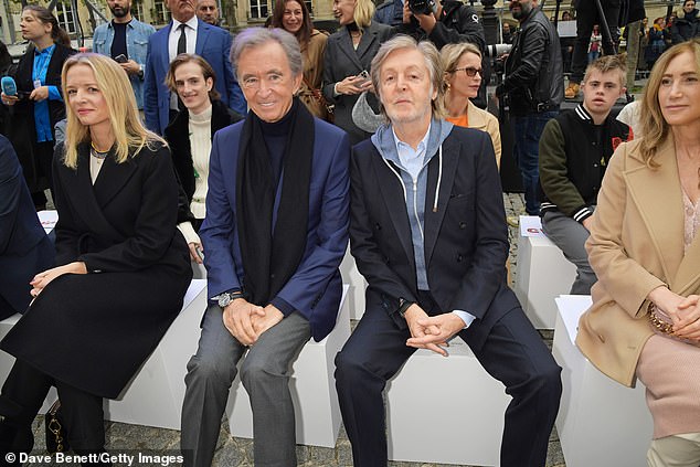 Delphine and Bernard Arnault attend the Stella McCartney show during Paris Fashion Week Spring/Summer 2023 in October with Sir Paul McCartney and Nancy Shevell