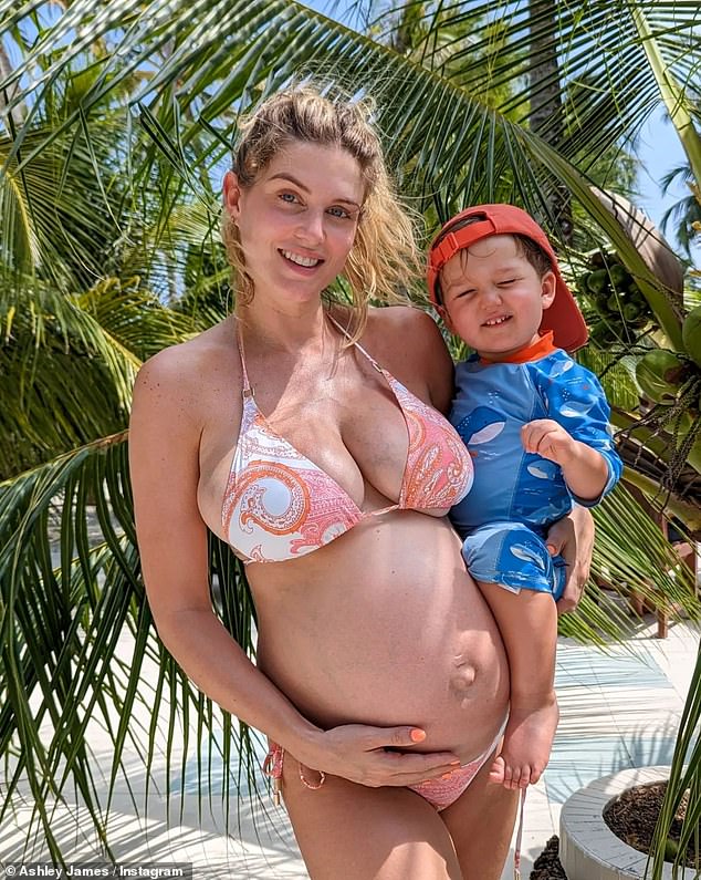 Loving mother: It comes after pregnant Ashley showed off her bump in a patterned bikini while cradling her son Alfie during their family vacation in the Maldives.