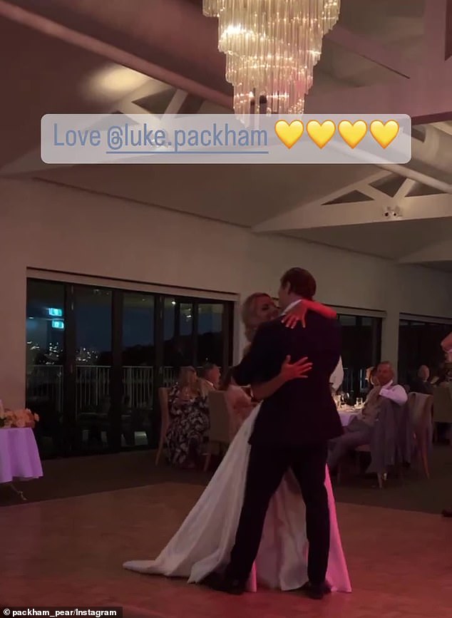 Olivia looked luscious in a strapless gown as she glided across the dance floor under a statement chandelier as guests looked on.  Josh captioned the motion pictures with four yellow love heart emojis.