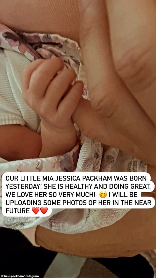 At the time, she shared a photo of the newborn squeezing her finger and writing: 'Our little Mia Jessica Packham was born yesterday!'