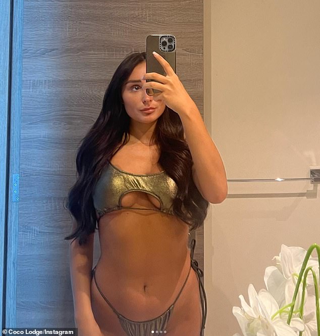 Skimpy: A third post from her vacation on Monday showed the influencer in a daring gold bikini with a cutout underneath.