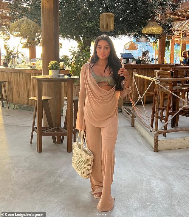 Stylish: The Love Island star wore a pale pink two-piece set by Sorelle over a bikini while enjoying a meal on Monday