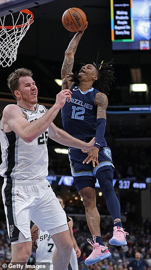 Morant hit a right-handed hammer dunk on Spurs center Jakob Poeltl with 3:35 left to help Memphis hold on to its lead.