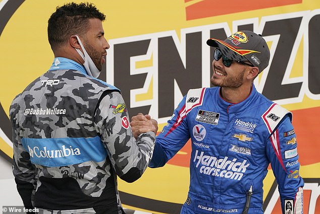 Nearly 11 months after being suspended and fired for saying a racial slur on live television, NASCAR driver Kyle Larson (right) won the 2021 Pennzoil 400 in Las Vegas and was promptly congratulated by the only black driver on the circuit , Bubba Wallace (left).