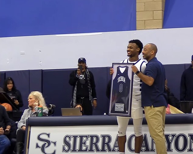 James was honored before the game at a ceremony when he received a framed jersey.