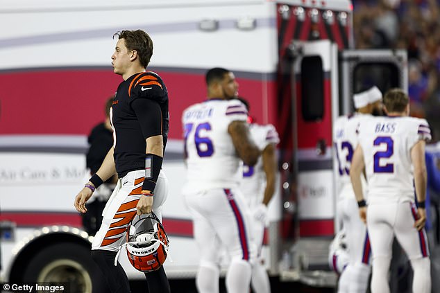 Joe Burrow #9 of the Cincinnati Bengals reacts to an injury sustained by Damar Hamlin #3 of the Buffalo Bills during the first quarter of a game at Paycor Stadium on January 2.