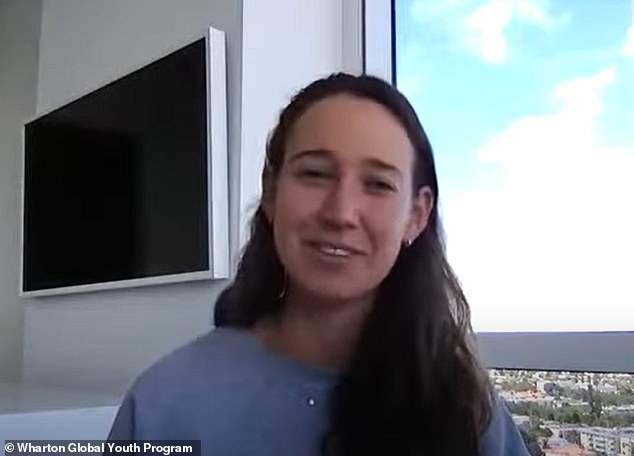 Javice (pictured in a modern-looking skyscraper with sunny skies in the background) on a call with her former tutor at Wharton, who was interviewing her about her business success while she was with her family in Florida.