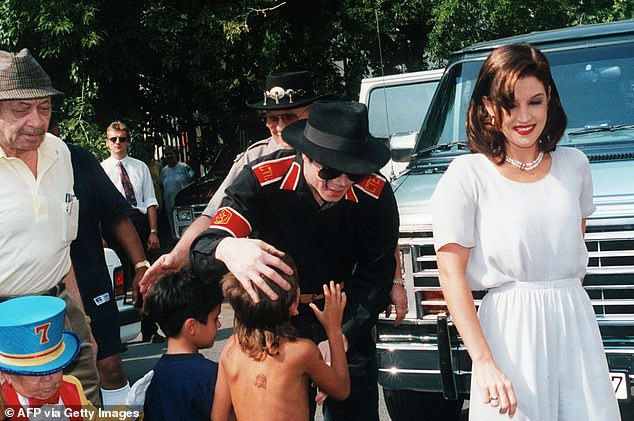 Michael Jackson and his wife Lisa Marie Presley with children in Budapest in August 1994