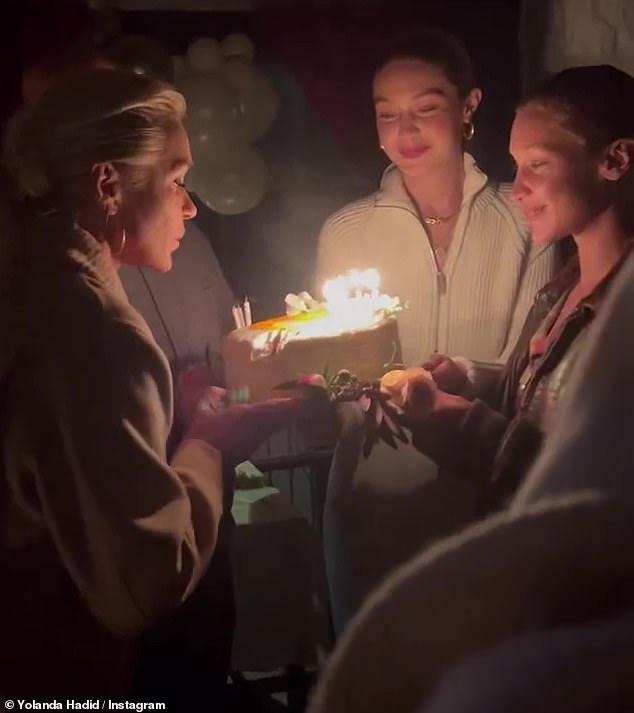 Birthday Wish: After closing her eyes to make a quick wish, Yolanda blows out a portion of the candles on the cake before trying again to successfully blow out the rest.