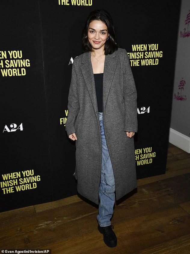 Cool and casual: The West Side Story star appeared at the screening in a long gray coat and blue jeans  She completed her look with black lace-up boots and a matching black shirt.