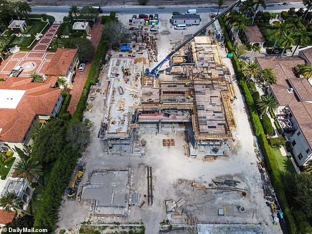 Construction at the Tom Brady compound is busy with construction workers on September 7