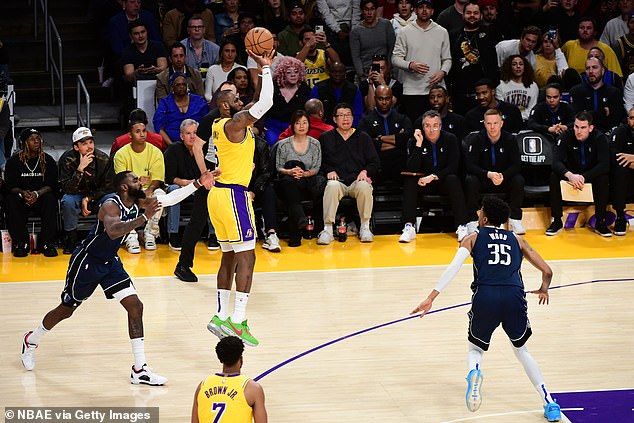 James made two free throws to put the Lakers up 108-105 at the end of the first overtime