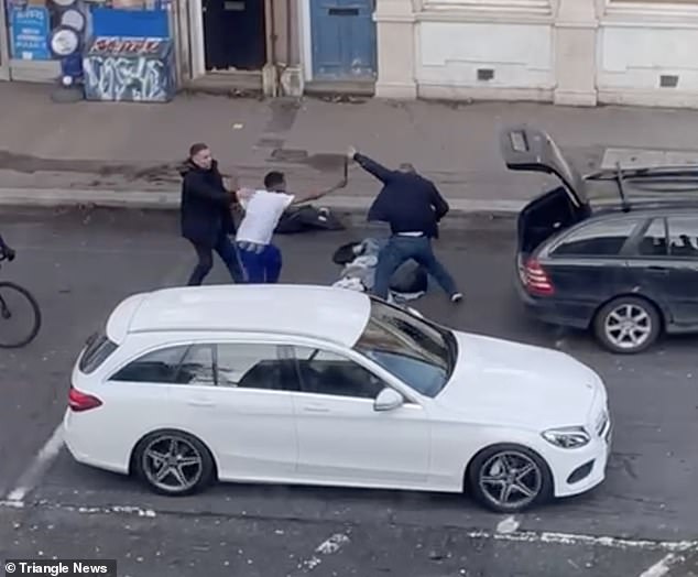 The fight escalated between two men in a Mercedes Estate and a pedestrian in Acton, west London, on January 11.