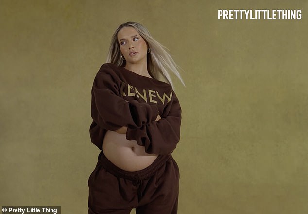 Stylish: As the clip began, the 23-year-old Love Island star posed in a cropped brown tracksuit, looking to the side