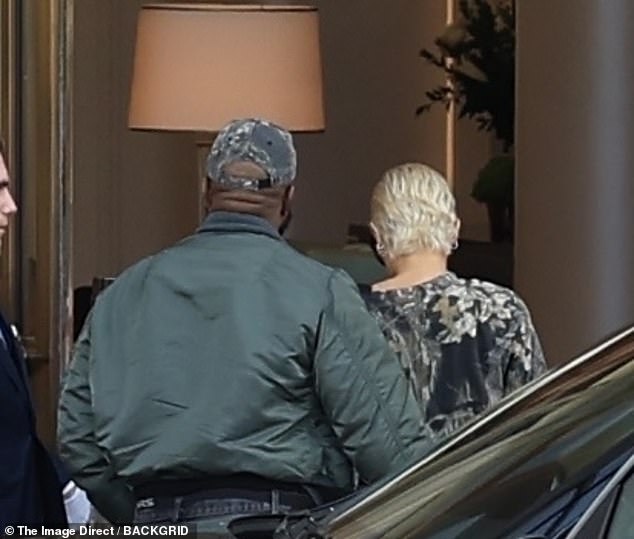 The two looked comfortable together as they made their way to the hotel.