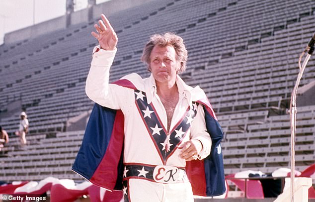 He had a wild public persona: Evel in his flashy suit while posing for a portrait before a stunt in 1976.