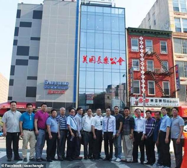 Workers at the American Changle Association pictured outside their offices last year