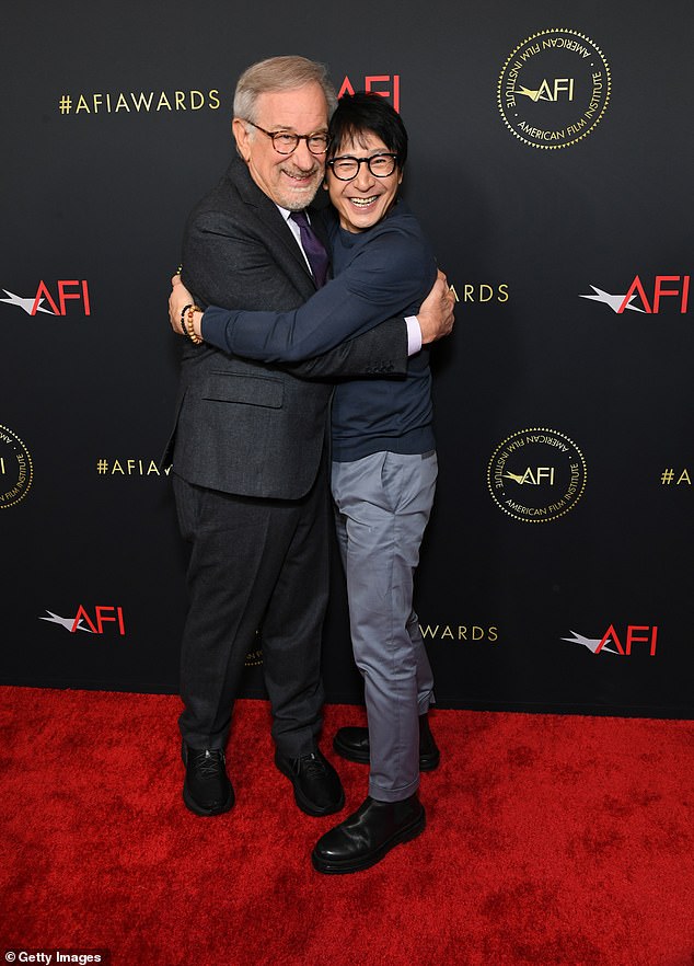 Hug: Ke Huy Quan, who played Short Round in Indiana Jones and the Temple of Doom, which Spielberg co-wrote and directed, gave Spielberg a big hug at the event.