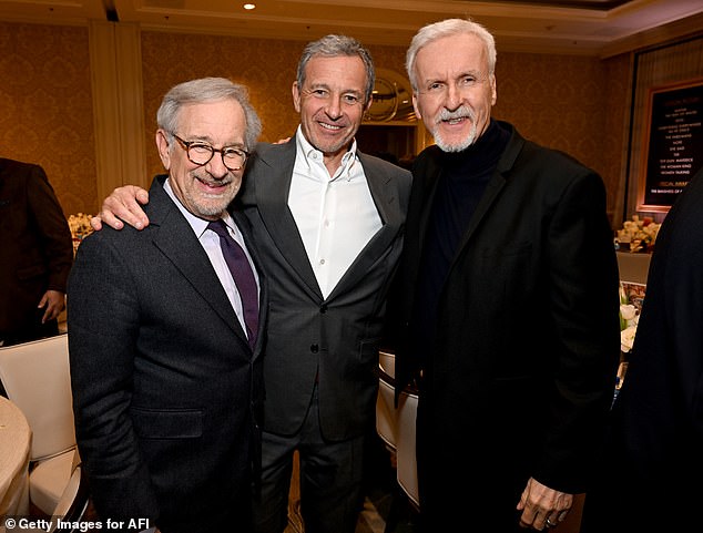 Legendary directors: Spielberg also posed with fellow director James Cameron, who directed the hugely popular Avatar: The Way of Water, which was released in December (left to right: Spielberg, Bob Iger, Cameron)