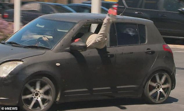 The 45-year-old man threw himself out of the open passenger-side window in a dramatic effort to avoid reporters.