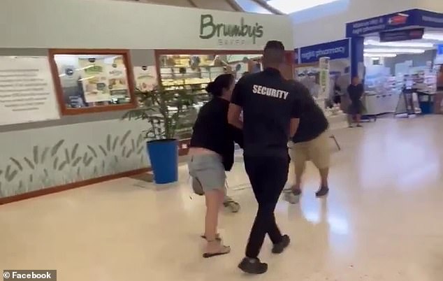 The woman was escorted out of the store by security.  Woolworths plans to ban it from the store