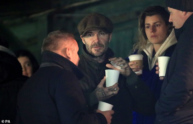 David Beckham was photographed again when Romeo made his second appearance.