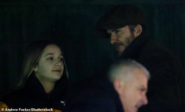 His sister Harper joined their father David in the crowd for the Premier League Cup match.