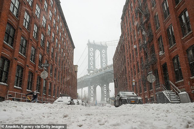 Snowy view of Dumbo of Brooklyn in New York City as a massive snowstorm hits the East Coast on January 29, 2022