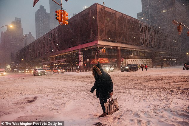 The streets of New York City are covered in snow during the blizzard on January 29, 2022