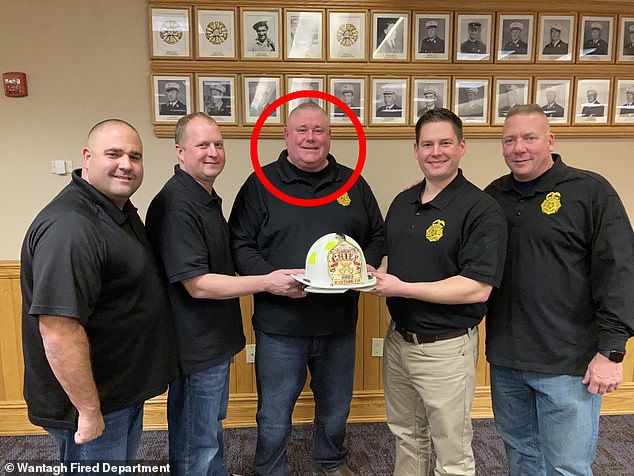 Kelly accused of the 'grotesque attack' is seen here (circled in red) with colleagues in 2021