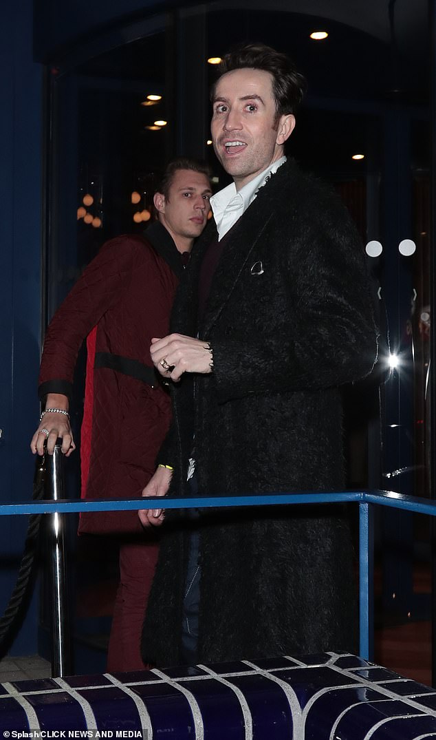 Smart looking: Also in attendance was Nick Grimshaw, who cut a smooth figure in a white shirt and black pants, which he teamed with a long dark jacket.