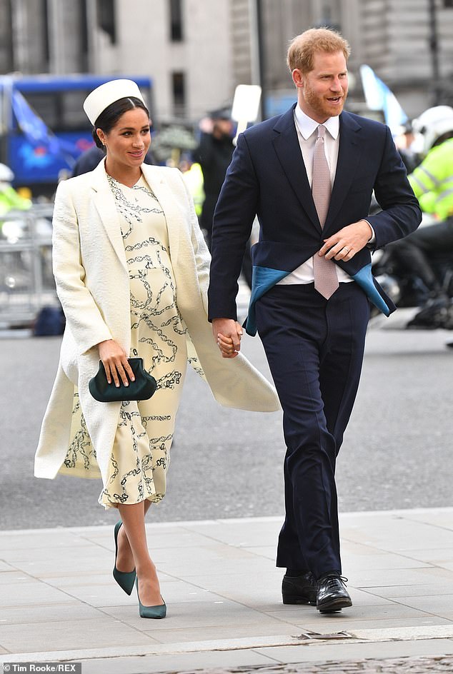 Meghan arrives at Westminster Abbey for Monday's Commonwealth Day service, wearing a chain-print Victoria Beckham dress and Erdem coat.