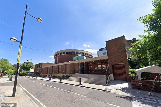 All four suffered gunshot wounds when unidentified perpetrators fired from a vehicle in front of St Aloysius Church (pictured) on Phoenix Road