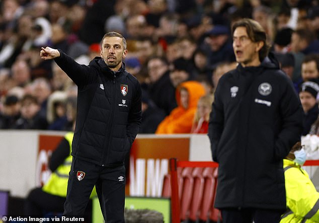 Gary O'Neil, left, watched his team beaten for the fourth game in a row as Thomas Frank's side soared