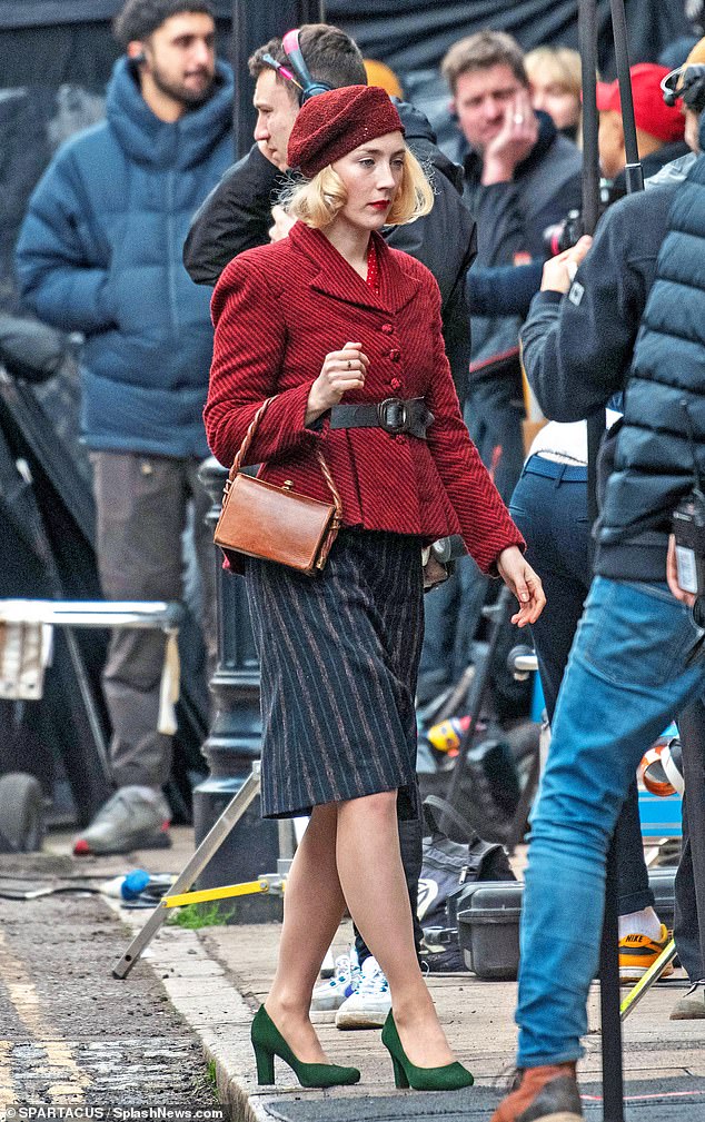 The cast was seen last week filming on Roupell Street near Waterloo Station, which has been featured in hundreds of movies, TV shows and advertisements (Pictured: Saoirse Ronan)