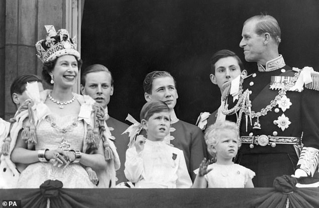 The then Prince Charles (centre) attends the coronation of his mother, Queen Elizabeth II (left), in 1953, following the death of his grandfather George VI.  Now there's concern that his own big day will be overshadowed by chaos if he doesn't mend the rift between his children.