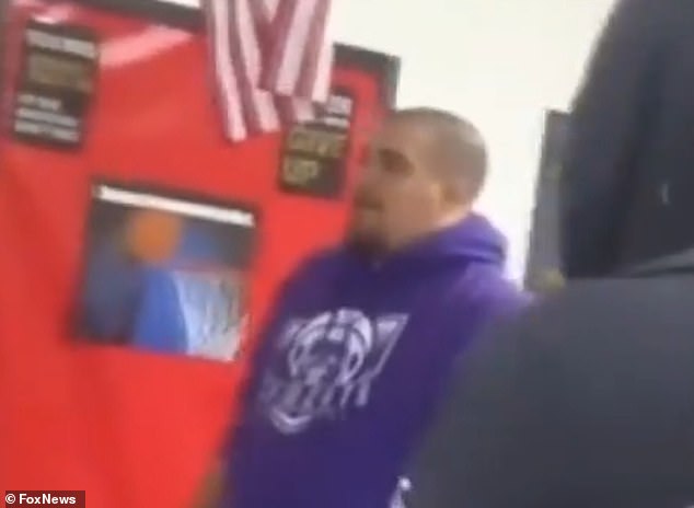 A Texas English teacher is under investigation after he was filmed beating a student and violently pressing him against a classroom wall.