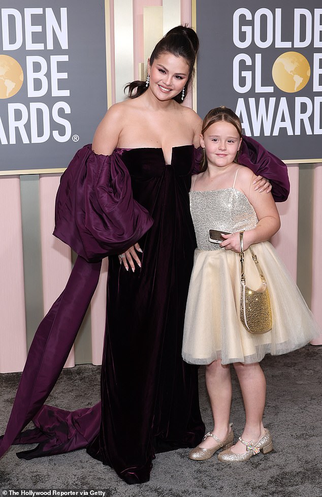 Big night: She brought her nine-year-old brother as her date to the glamorous ceremony, which was attended by Hollywood stars