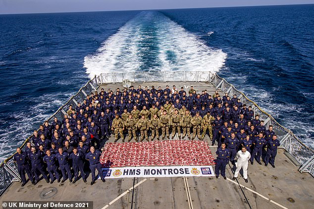 Montrose has staged five successful drugs busts in 2022, the most in the ship's three-year history in the Gulf. Pictured is the ship's crew with one of their hauls