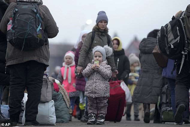 Professor Sutcliffe said: 'When I saw these children last year in these little hats, in the freezing cold being ripped out of their homes, I felt compassion for them'