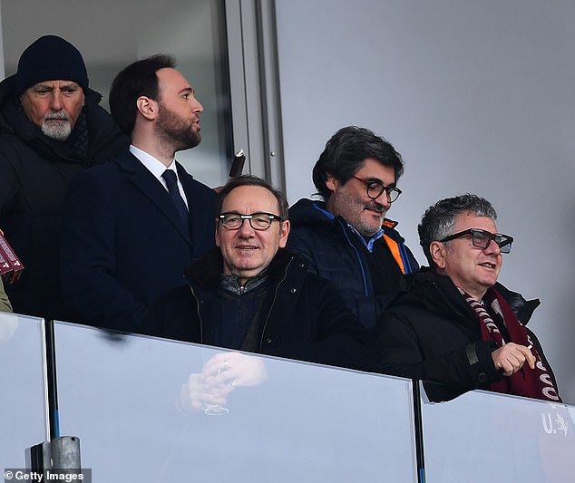 Match: The 63-year-old American actor (pictured third from right) was watching an Italian Serie A match between Torino FC and Spezio Calcio on Sunday, which ended 1-0 against Spezia.