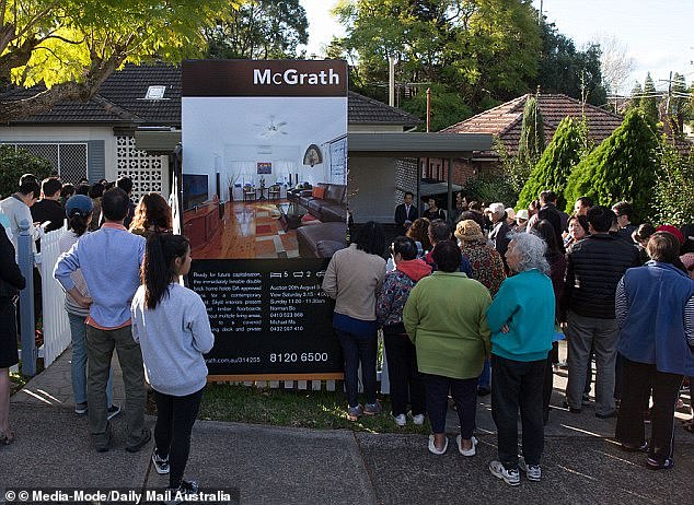 Instead of paying the stamp duty fee in advance, buyers could choose to pay an annual property tax to the state government.  Pictured: A Sydney home auction