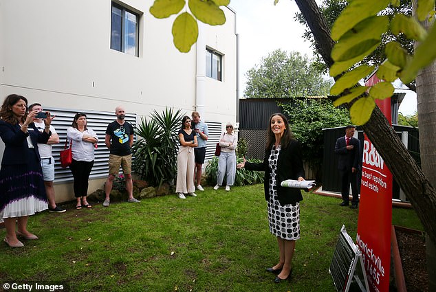 The average stamp duty in Sydney is $49,934.  Pictured is an auction at Hurlstone Park in Sydney's inner west.