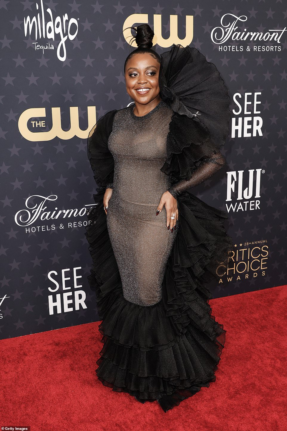 Gorgeous: Quinta Brunson looked amazing in a sheer black and nude number