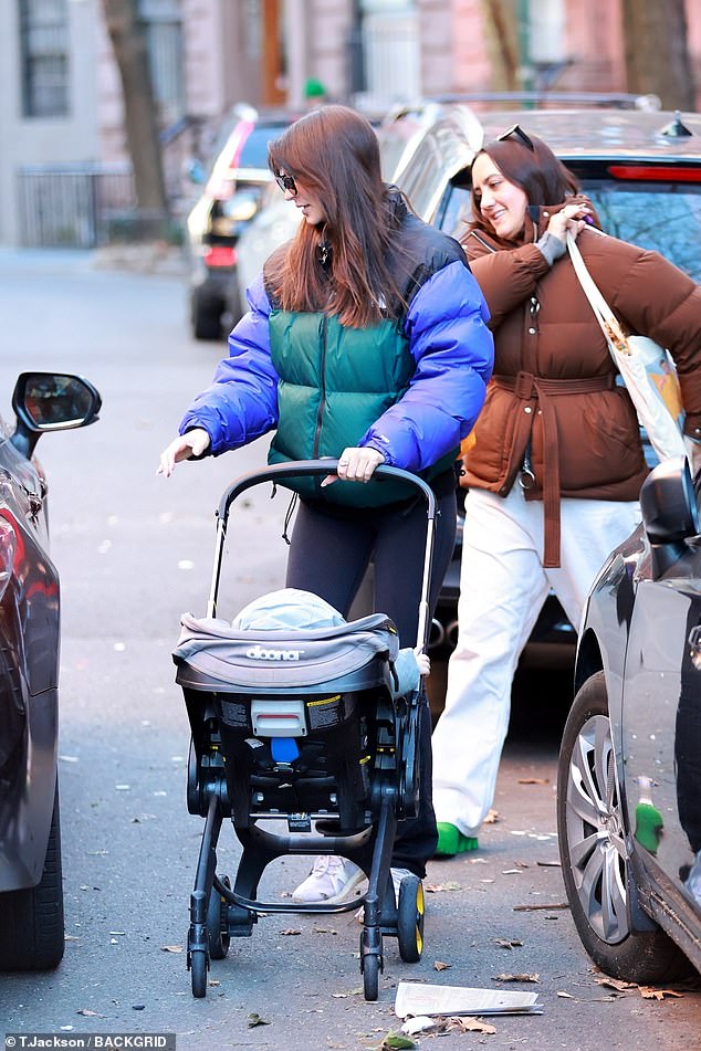 Friendship: She was joined on the Sunday outing by childhood best friend Babs, who was equally stylish in a brown coat