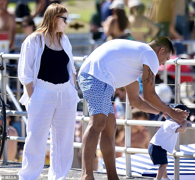 She let her brown locks fall freely around her shoulders and completed her look with stylish designer sunglasses.