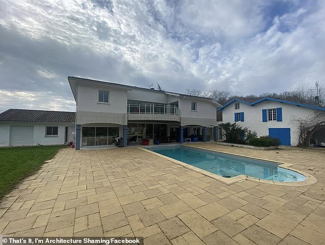 The exterior of the house was also decorated with white ceramic tile that can be found in the bathrooms, the cracks filled with discolored grout.